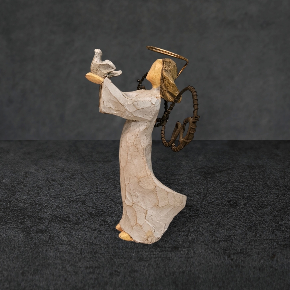 Angel of peace Figurine holding dove
